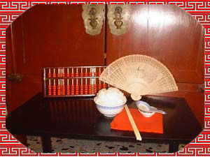 1. A bowl of cooked rice is white like snow. A par of bamboo rods is essential as accessory.